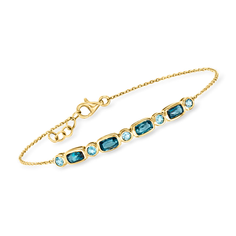 14kt yellow gold topaz bracelet with oval sky-blue gemstone stations and chain