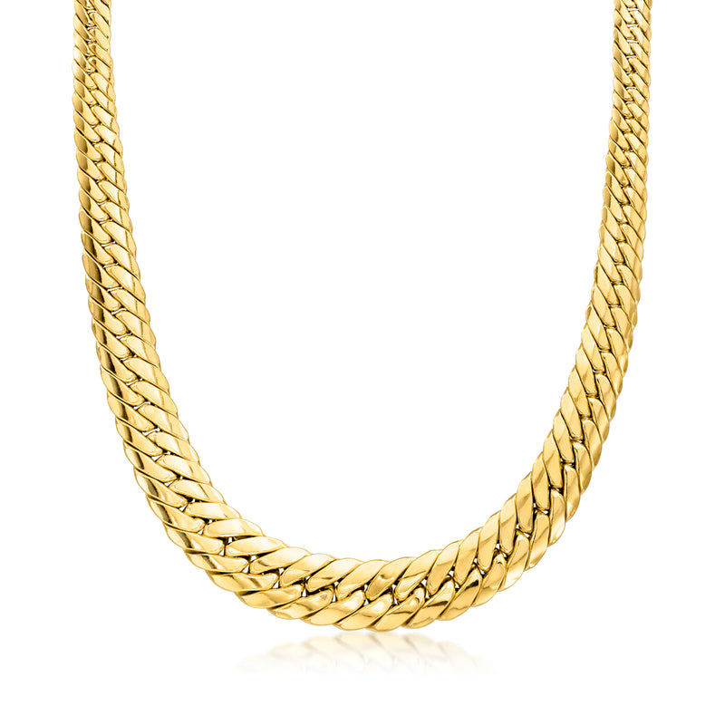 Yellow gold graduated Cuban-link necklace with braided chain links, close-up