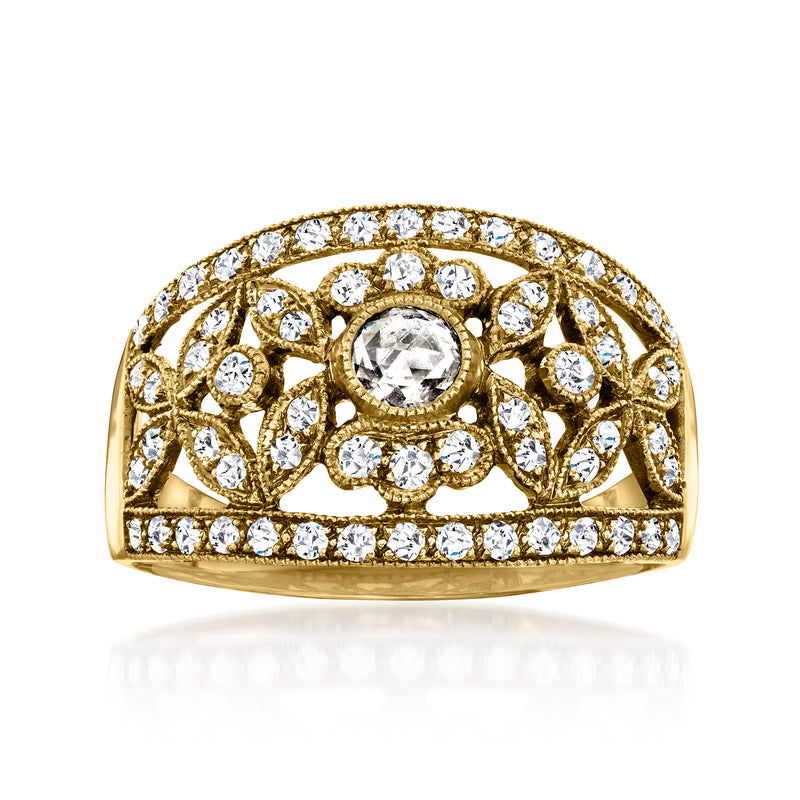 Vintage 18kt yellow gold diamond flower ring with round clear stones, dome top