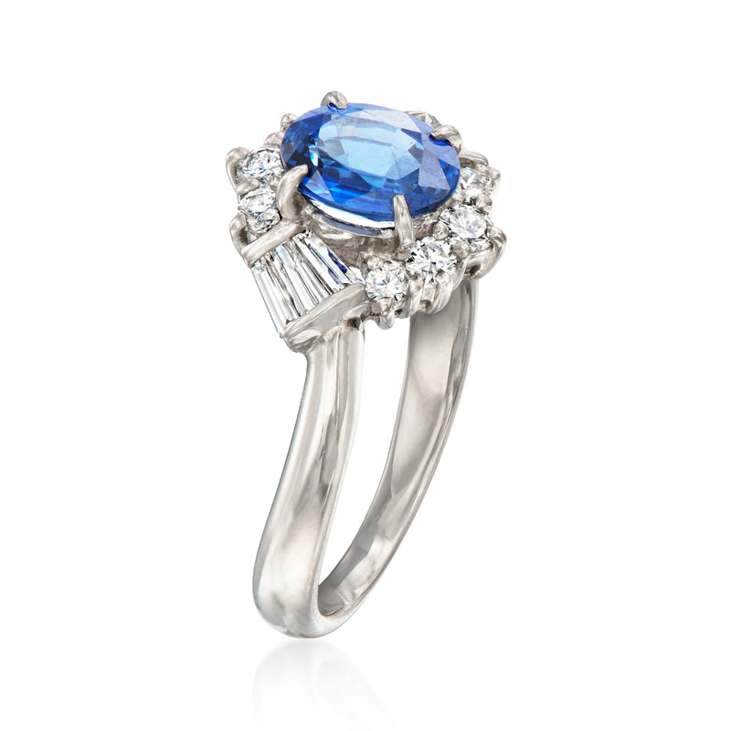 Platinum sapphire and diamond ring with oval center stone and baguette shoulders