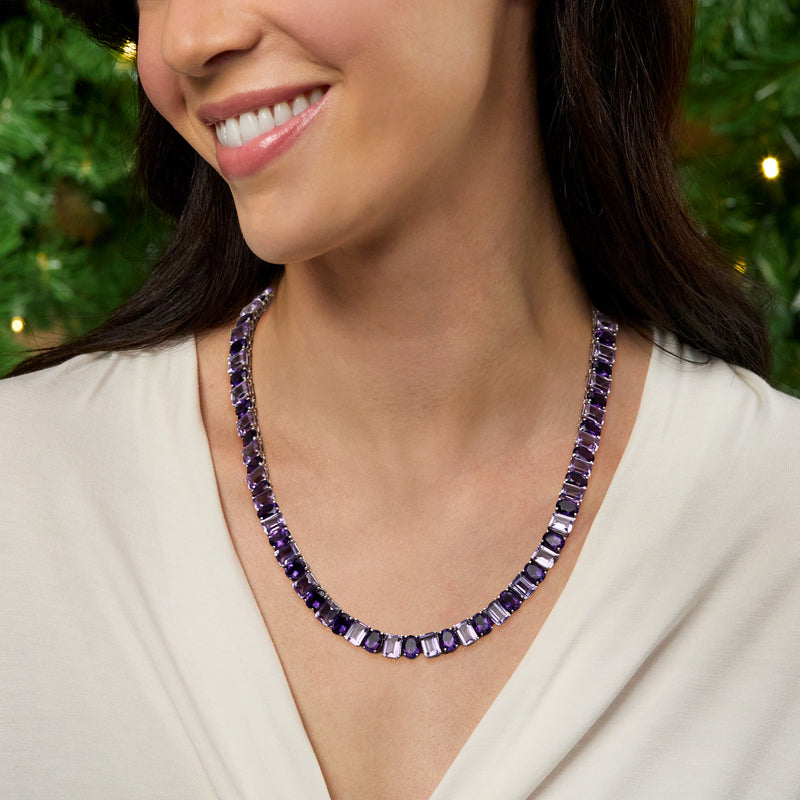 Sterling silver amethyst tennis necklace worn at the neckline