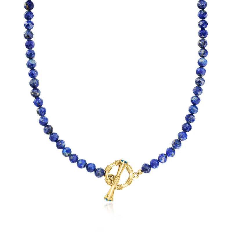 Blue lapis bead toggle necklace with gold-tone clasp and blue topaz charm