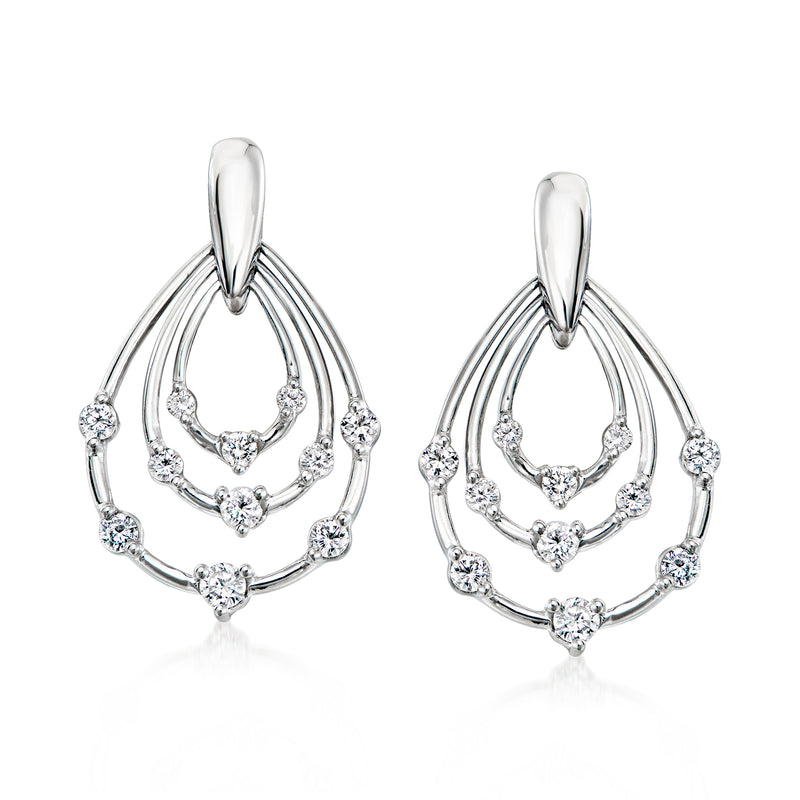Platinum diamond teardrop earrings with concentric curved settings, post style