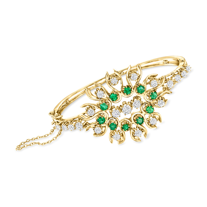 Yellow gold bangle bracelet with diamond and emerald green stone clusters