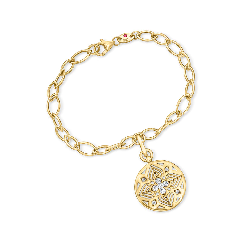 18kt yellow gold charm bracelet with round floral pendant and small diamond accents