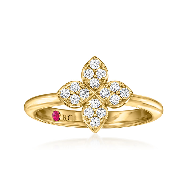 18kt yellow gold flower ring with white diamonds and small pink center