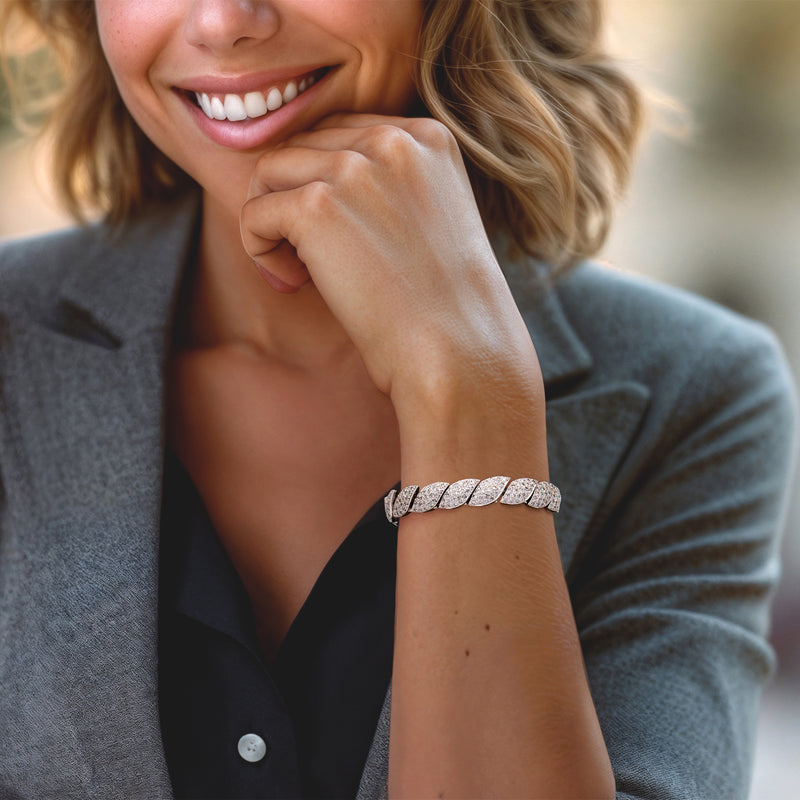 Diamond bracelet on wrist, curved links with pave stones in white gold