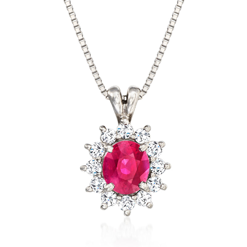 Platinum pendant necklace with oval red ruby and diamond halo, on link chain.