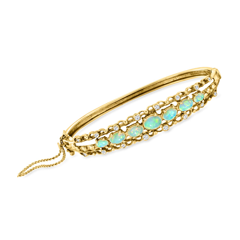 14kt yellow gold bangle bracelet with turquoise opal stones and diamond accents