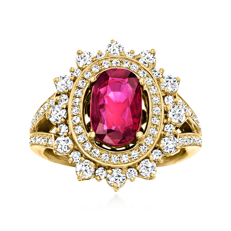 Vintage 18kt yellow gold ring with oval red ruby center and diamond halo