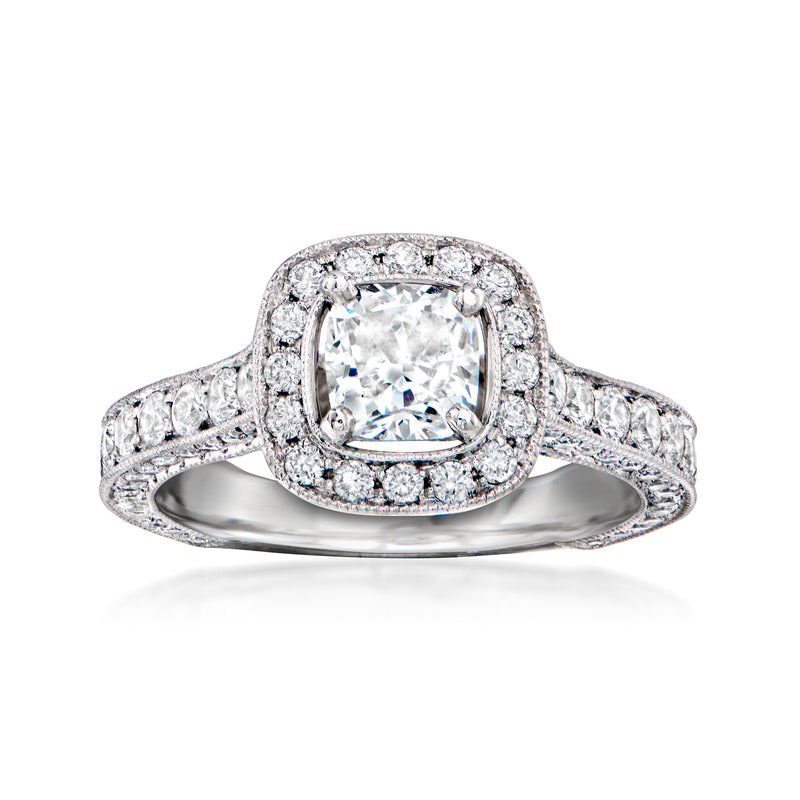 Diamond ring in platinum with cushion-cut center stone and pavé band