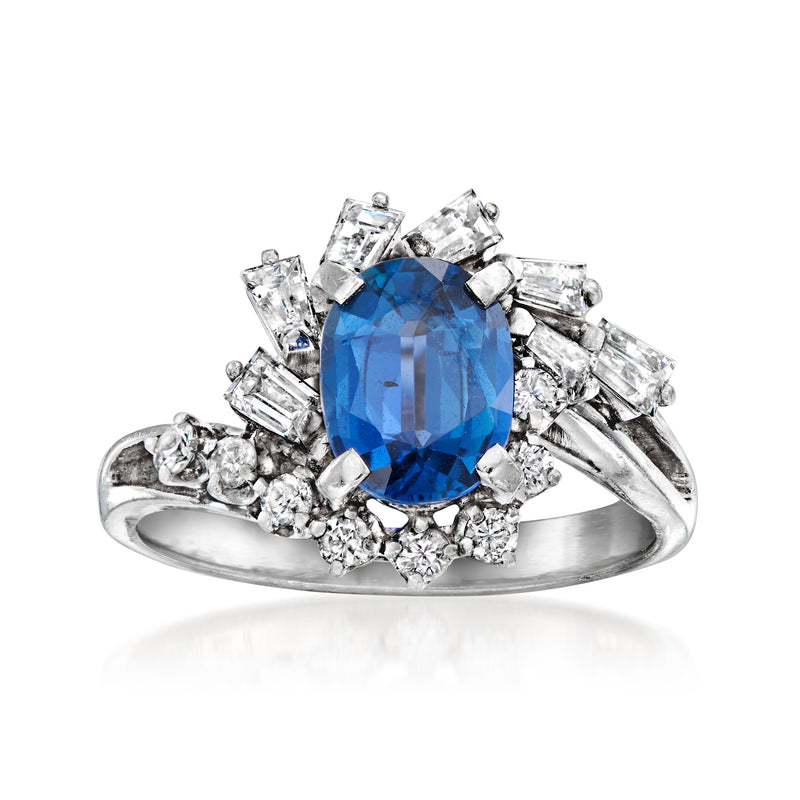 Platinum vintage ring with oval blue sapphire and sparkling diamond cluster, size 5