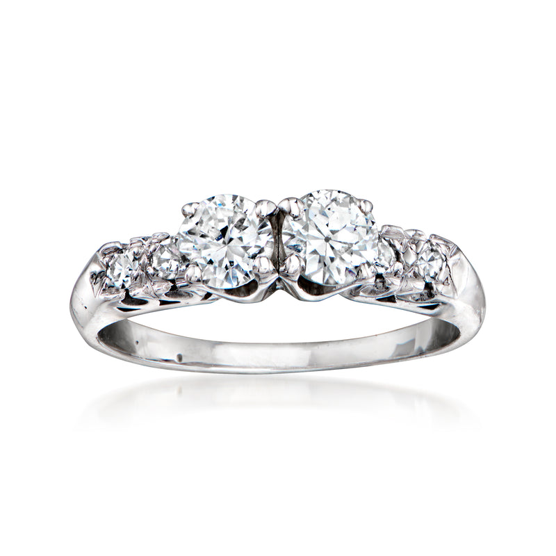 Vintage 14kt white gold toi et moi diamond ring with three round stones