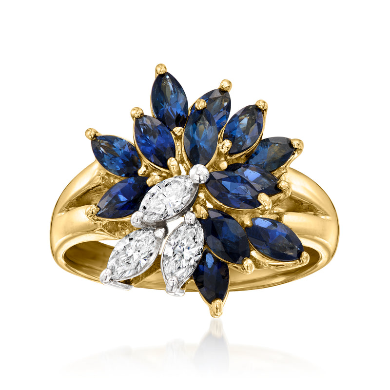 Yellow gold cluster ring with blue marquise sapphires and diamond accents