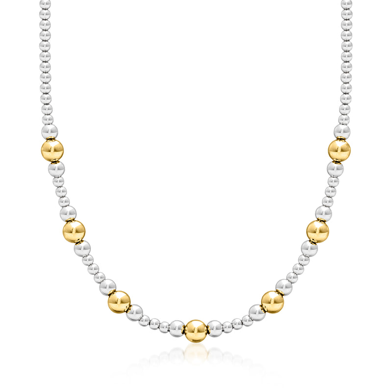 Graduated silver bead necklace with gold over sterling bead accents