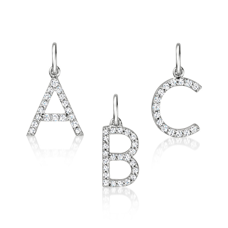 Sterling silver initial charm with diamond-look stones, letters A, B, and C