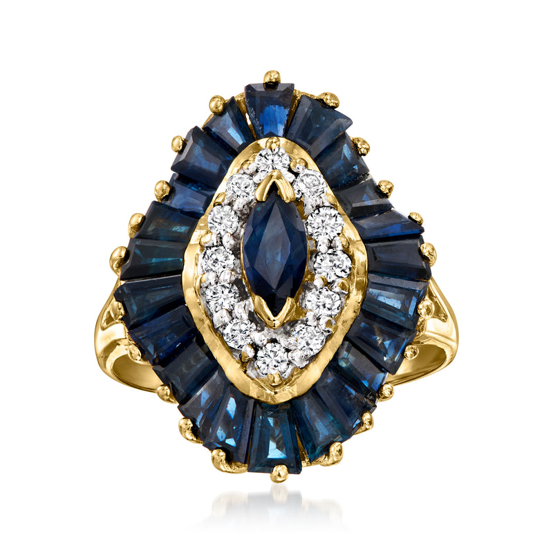 Vintage sapphire and diamond ring in 14kt yellow gold, oval blue center with diamond halo