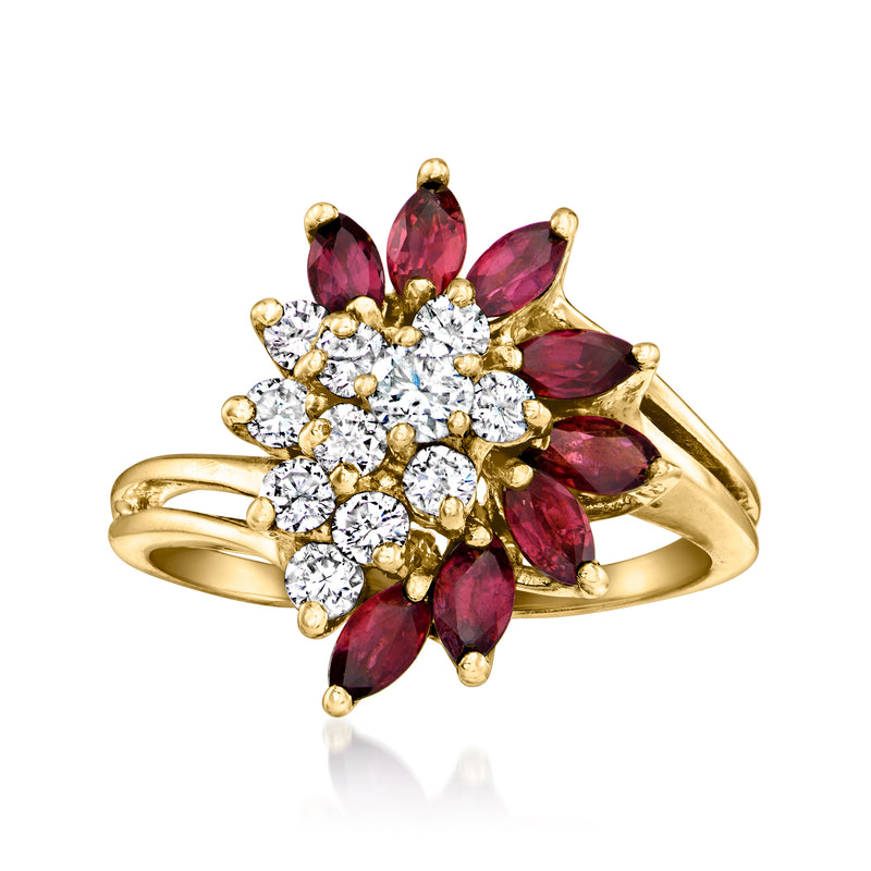 Vintage cluster ring in 14kt yellow gold with marquise ruby and round diamond accents