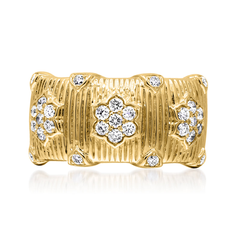 14kt yellow gold diamond flower ring with round diamond center and side stones