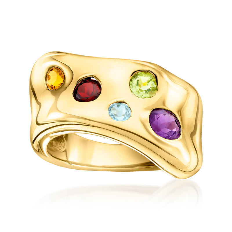 Gold sculptural ring with round gemstones: yellow, red, green, blue, purple.