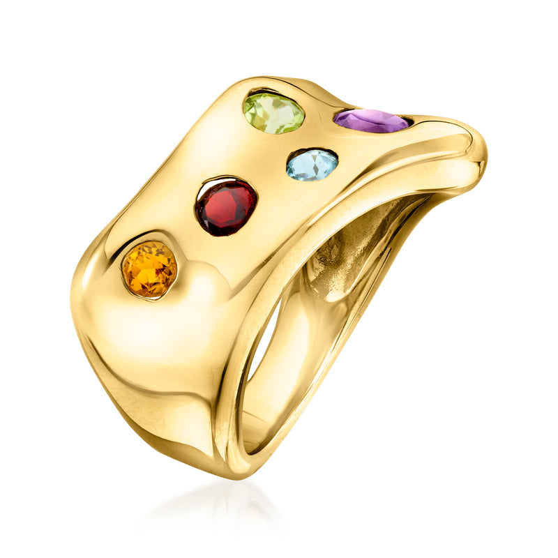 Gold sculptural ring angled view with round gemstones: green, purple, blue, red, yellow.