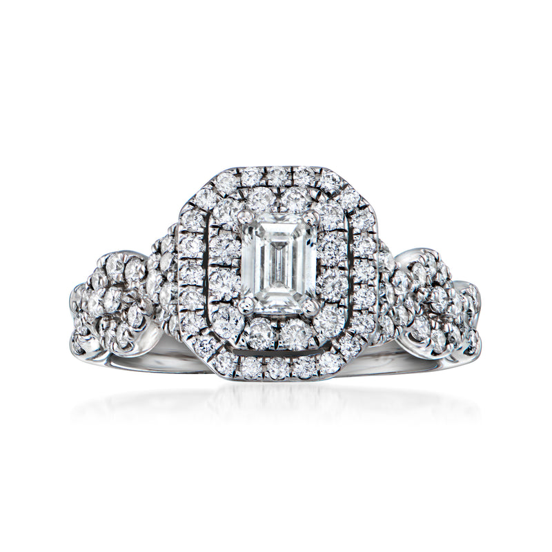 Vintage emerald-cut diamond ring in 14kt white gold with halo and diamond band