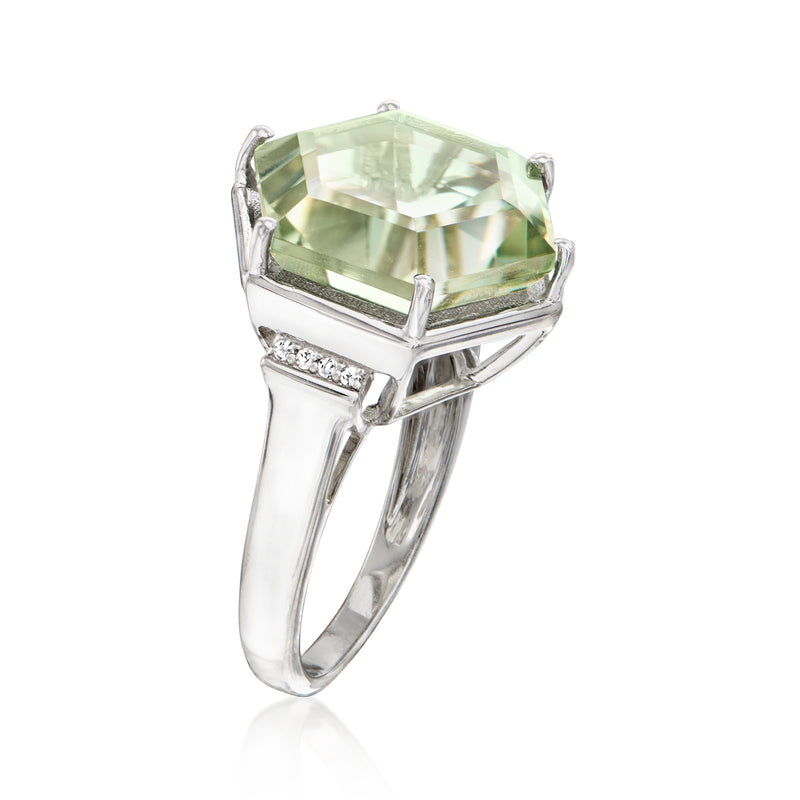 Sterling silver ring with emerald-cut light green gemstone and white zircon side accents