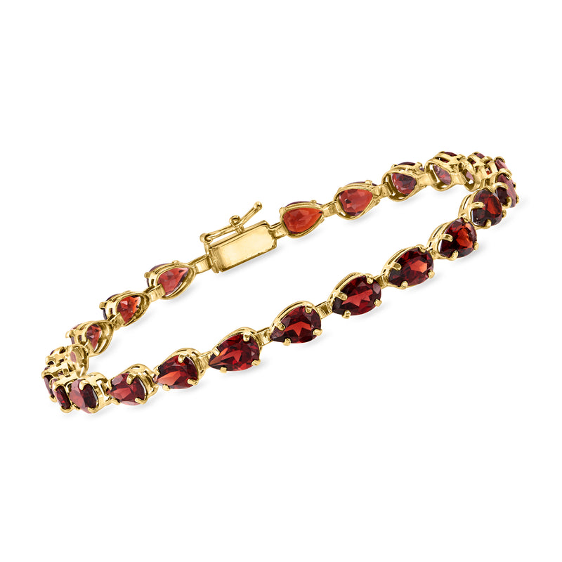 14kt yellow gold link bracelet with red garnet oval stones and box clasp