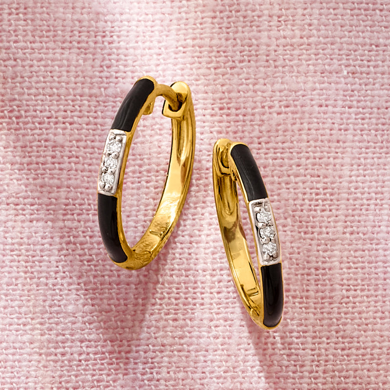 Black enamel and gold hoop earrings with small diamond rows on the front
