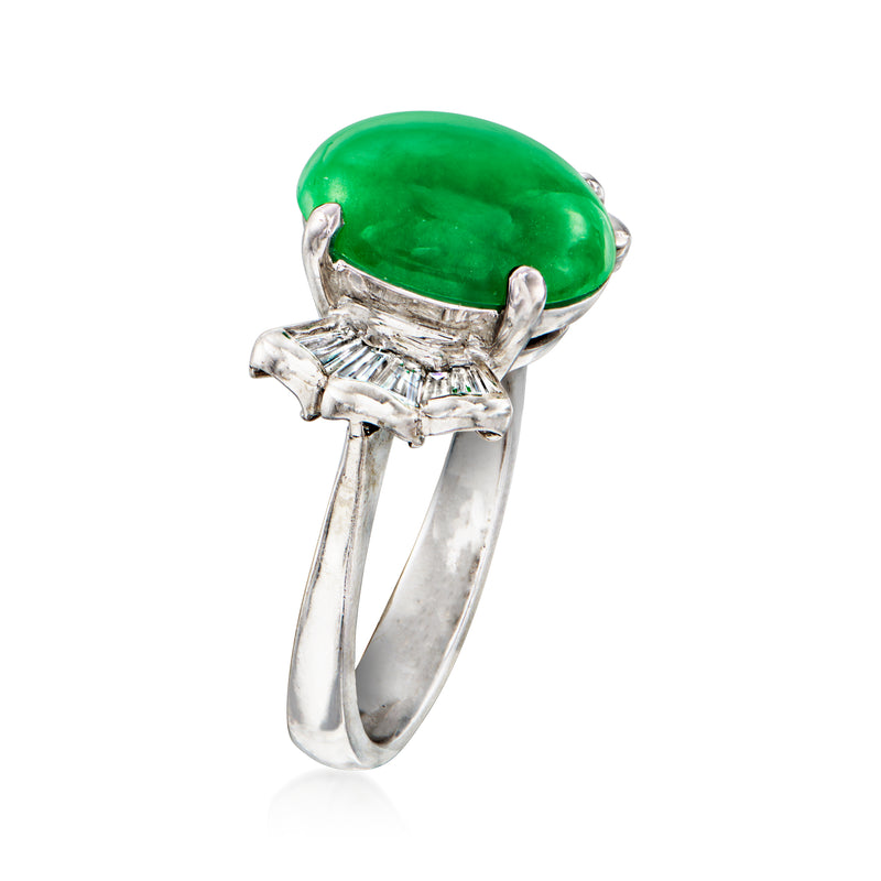 18kt white gold ring with oval green jade center and baguette diamond side prongs