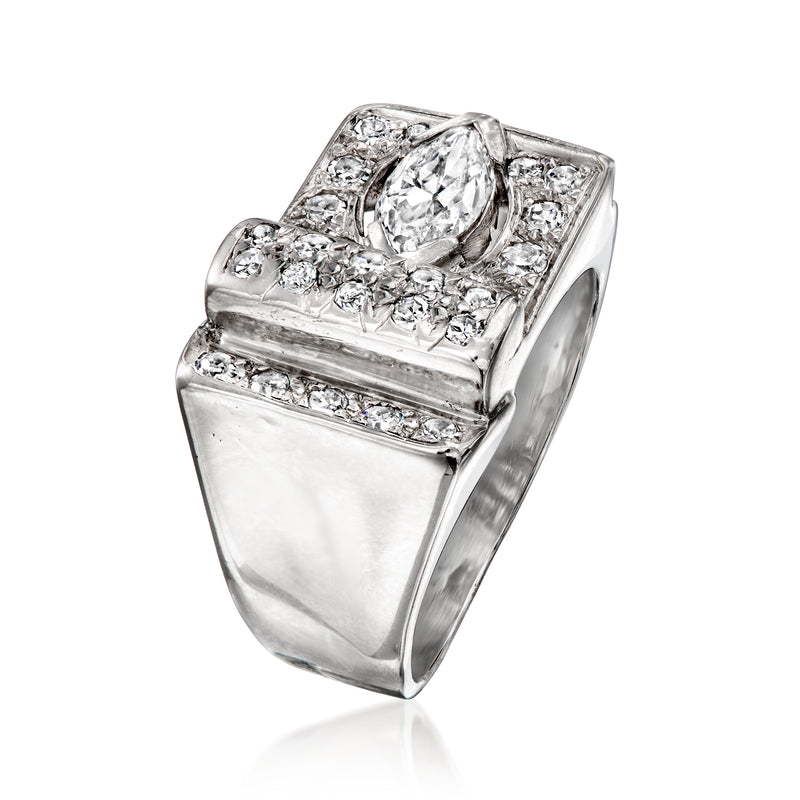 Platinum diamond buckle ring angled view with marquise center and side round diamonds
