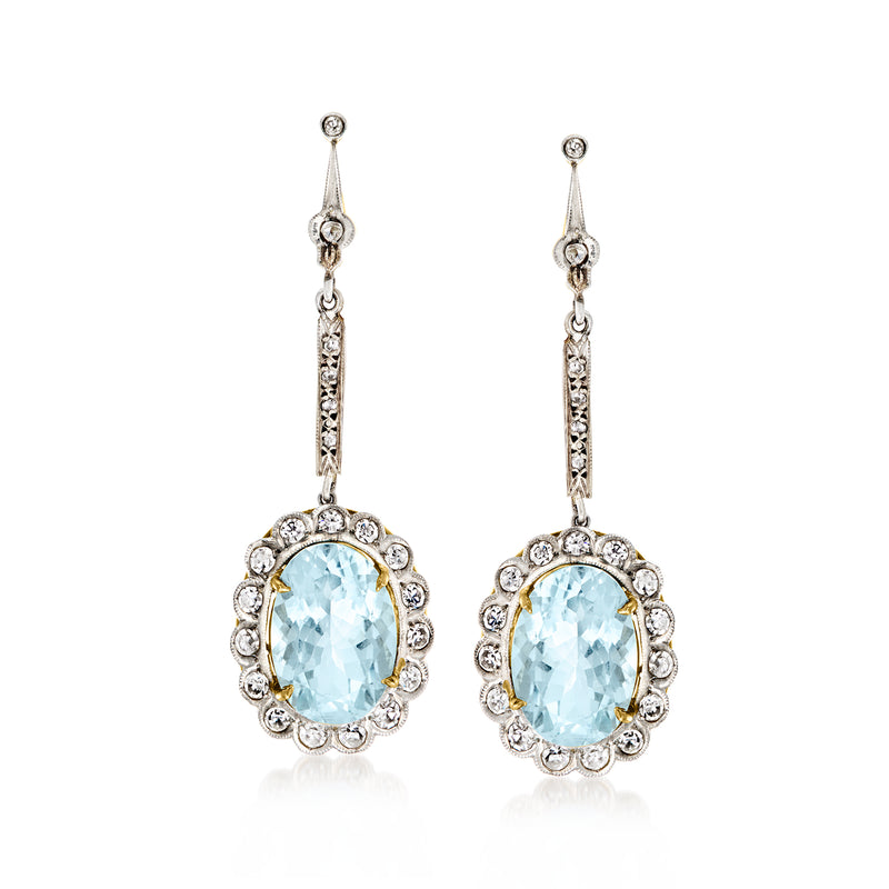 Blue aquamarine & diamond drop earrings in platinum with oval stone and halo