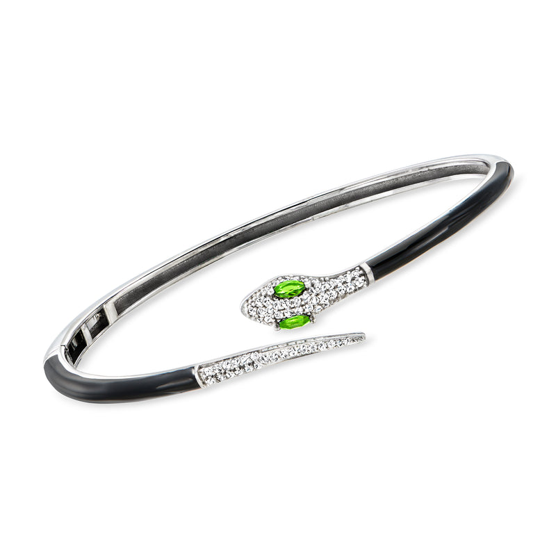 Sterling silver snake cuff bracelet with green gemstone eyes and black enamel accents