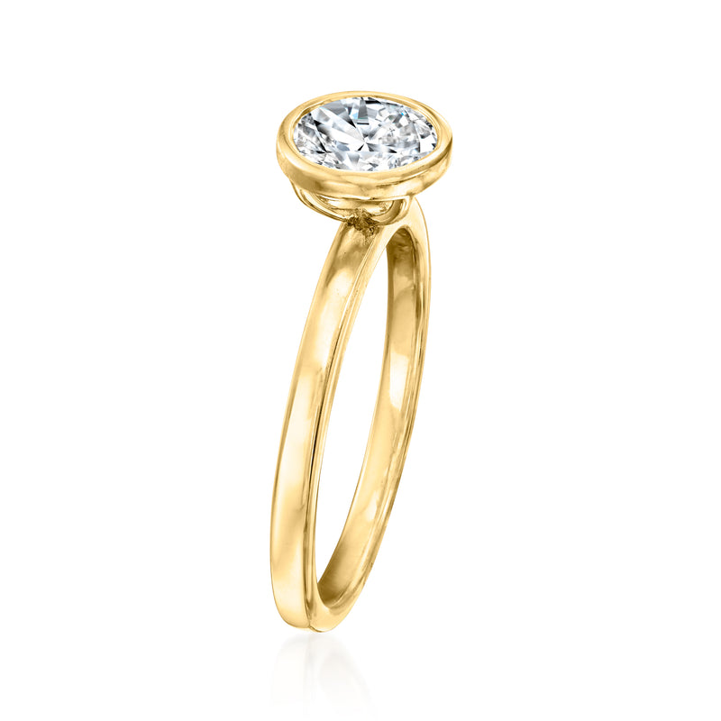 14kt yellow gold solitaire ring with round bezel-set diamond, open split band