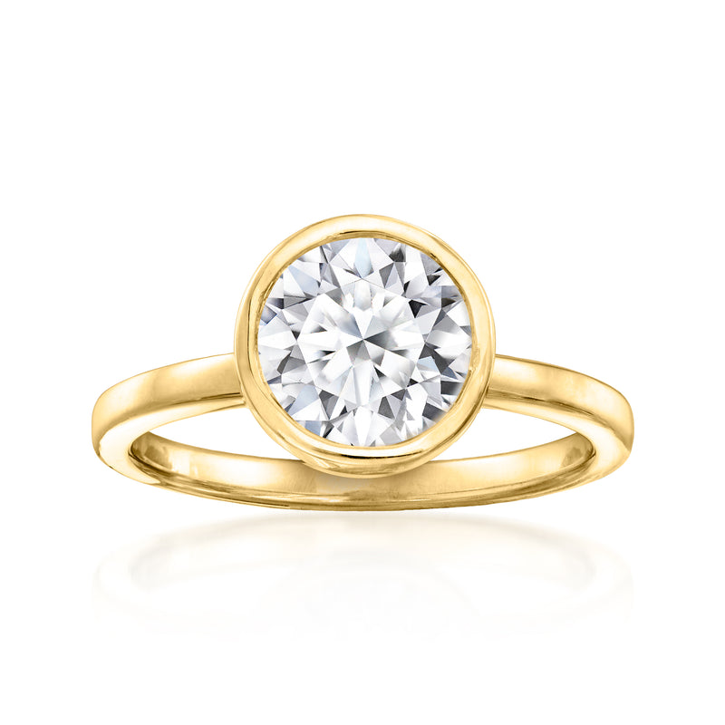 Bezel-set solitaire diamond ring in 14kt yellow gold with round center stone