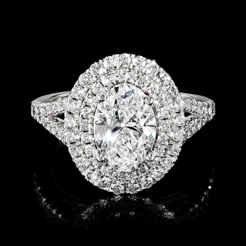 Oval lab-grown diamond halo ring in 14kt white gold
