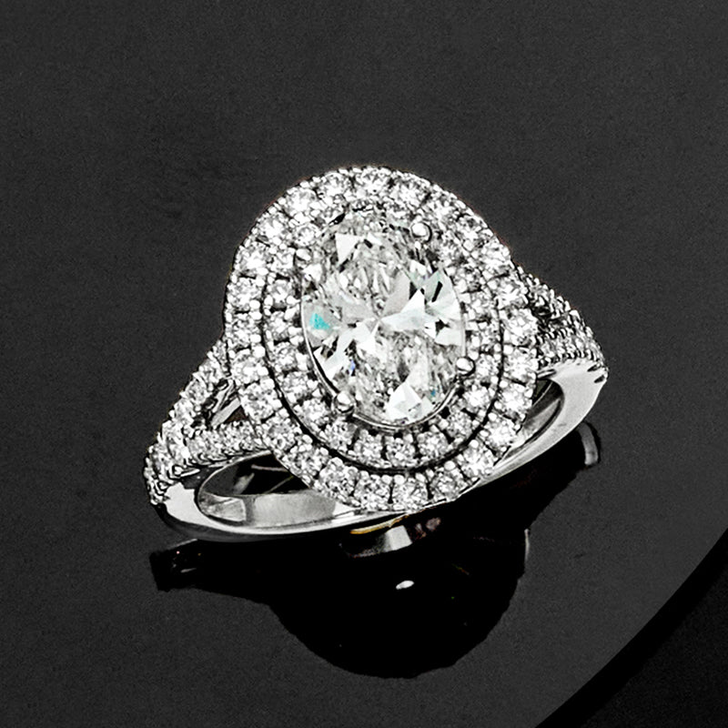 Oval lab-grown diamond halo ring in 14kt white gold