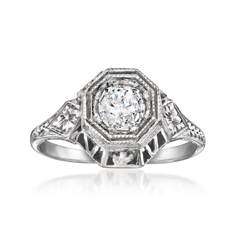 Vintage diamond filigree ring with round center stone in octagonal halo