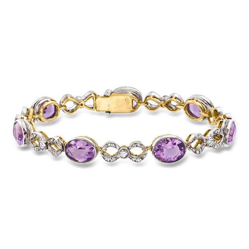 Amethyst and diamond link bracelet in sterling silver with yellow gold accents and oval stones