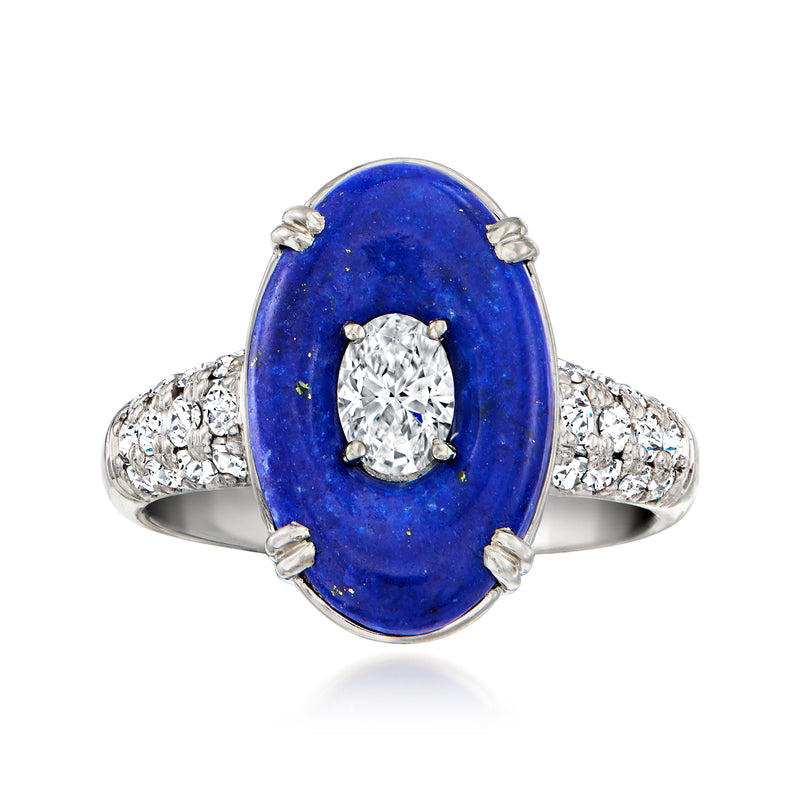 Platinum vintage ring with oval blue lapis center and bezel-set round diamond, pave shoulders