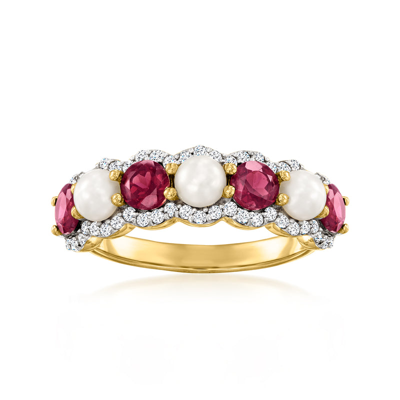 Gold-tone ring with two white cultured pearls, pink stones, and white zircon accents