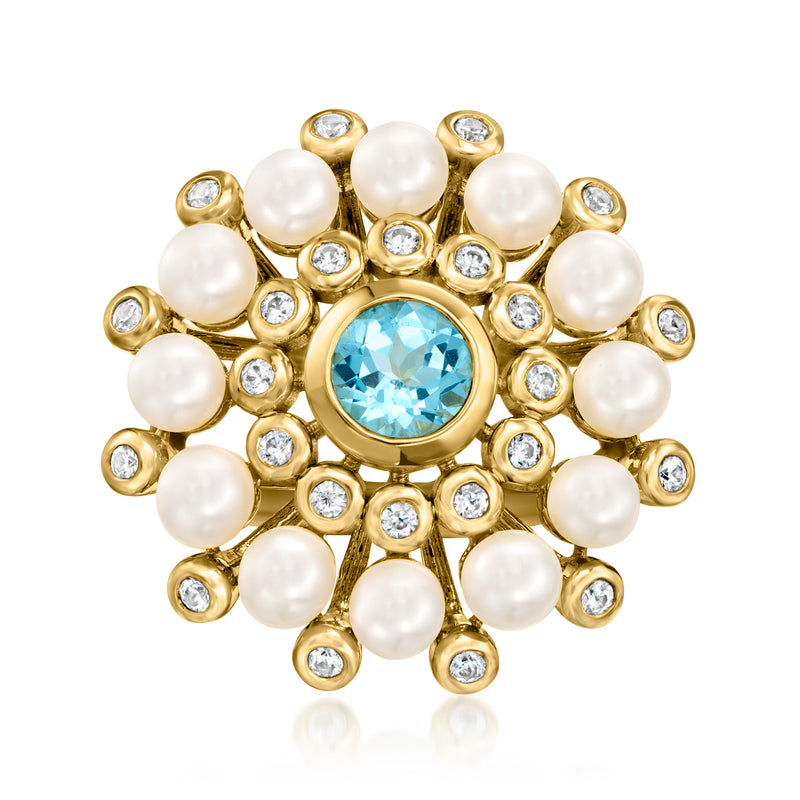 Gold round ring with blue topaz center, white zircons, and cultured pearl clusters