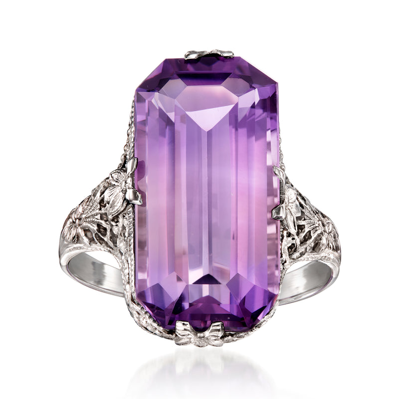 Vintage amethyst filigree ring with large rectangular purple gemstone in white gold