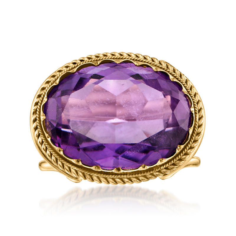 Vintage amethyst ring in 18kt yellow gold with oval purple gemstone and braided bezel