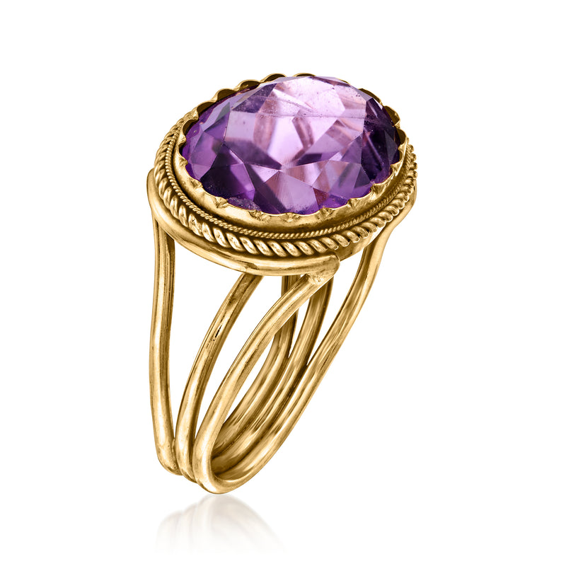 18kt yellow gold amethyst ring, oval purple stone set in braided bezel with raised prongs