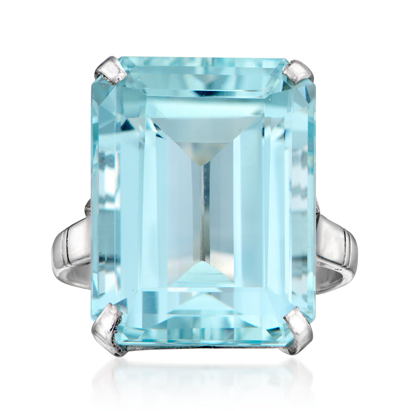 Vintage aquamarine ring in platinum, rectangular light-blue gemstone with four prongs