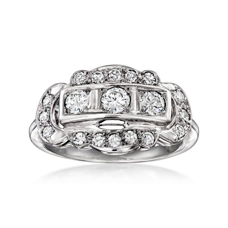 Vintage white gold diamond cluster ring with rectangular center and side halo
