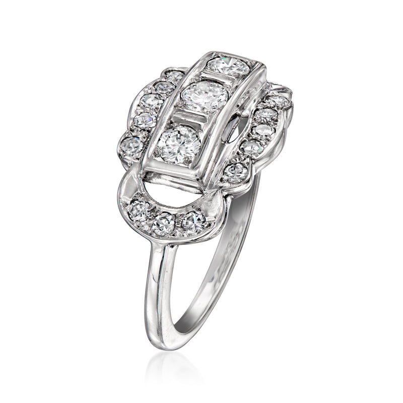 Side view of vintage white gold diamond cluster ring with rectangular center