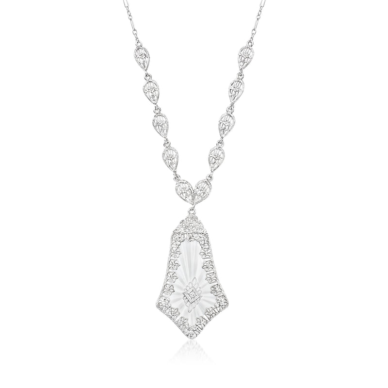 Vintage 14kt white gold filigree rock crystal necklace with oval link stations and dangling pendant