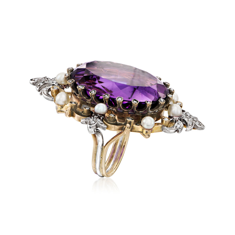 Side view of oval amethyst ring with pearl accents and diamond detail, yellow-gold and silver